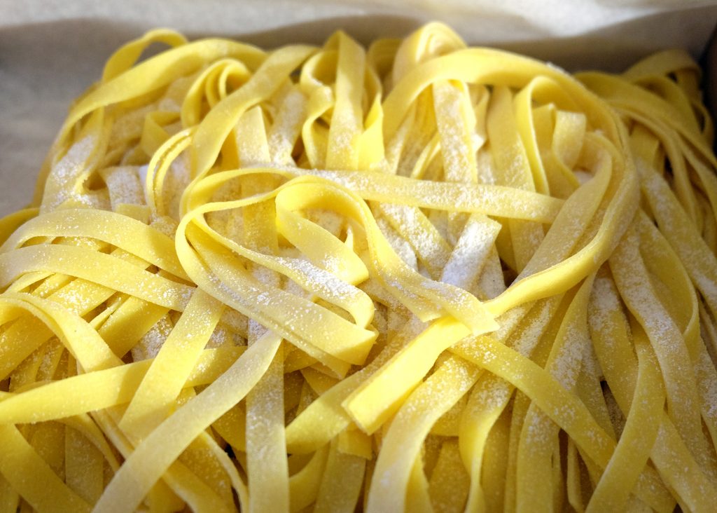 Fresh pasta tagliatelle in a box