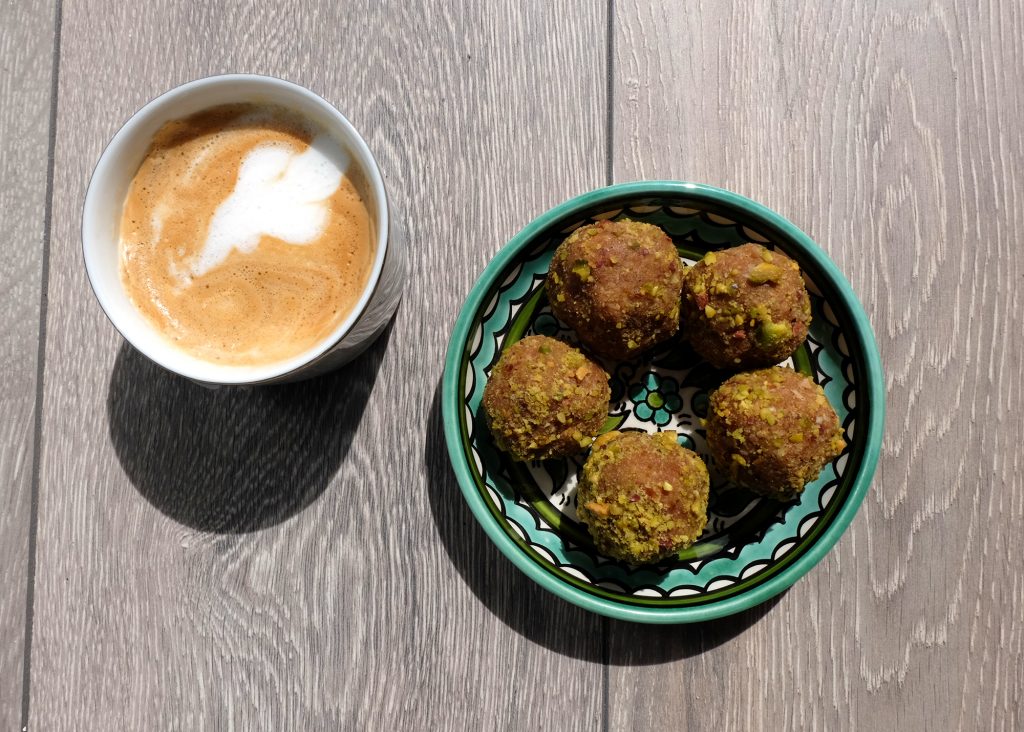 Protein balls snacks and a coffee cup