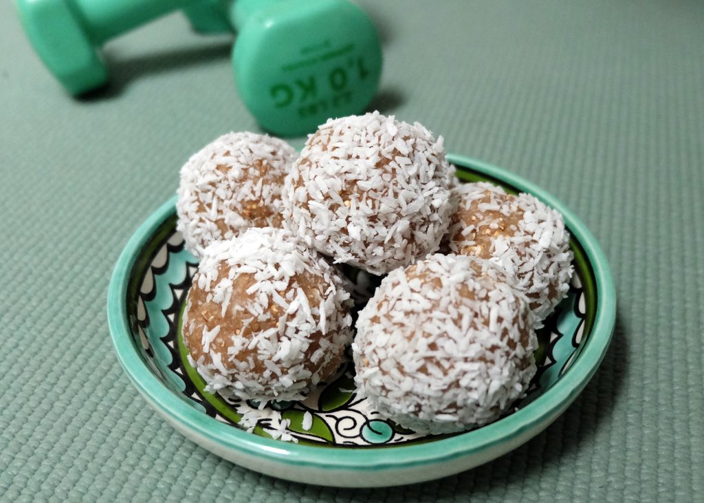 Protein snack balls rolled in coconut flakes
